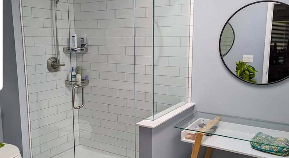With its gorgeous new floor tiles, the remodeled bathroom is now a true work of art.